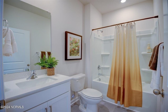 full bathroom with shower / tub combo with curtain, vanity, and toilet