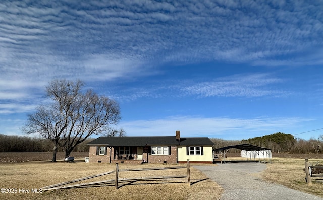 view of front facade featuring a carport