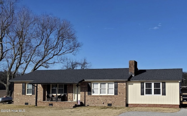 ranch-style house with covered porch