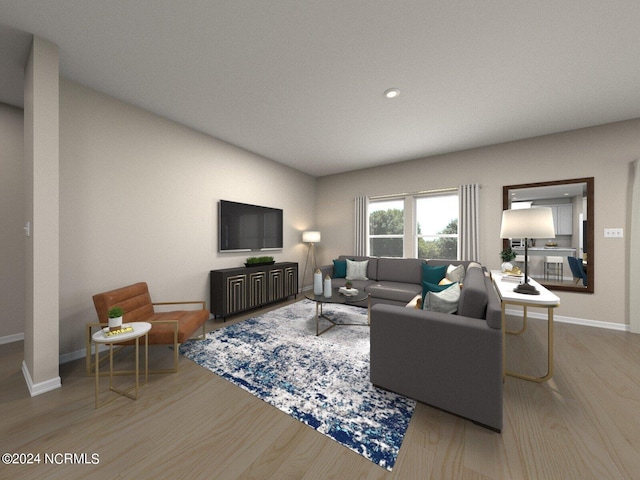 living room with recessed lighting, wood finished floors, and baseboards