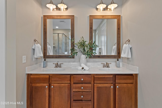 2537 St James Dr SE Unit 303, Southport, NC 28461 - bathroom featuring a chandelier, double vanity, and a shower stall