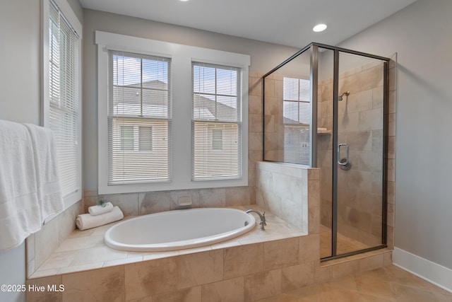 2537 St James Dr SE Unit 303, Southport, NC 28461 - full bath with a garden tub, a shower stall, tile patterned floors, recessed lighting, and baseboards