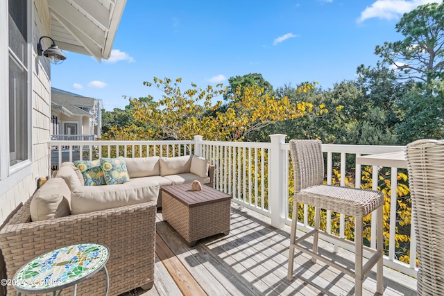 2537 St James Dr SE Unit 303, Southport, NC 28461 - deck featuring outdoor lounge area