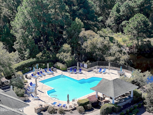 view of pool with a patio and a gazebo