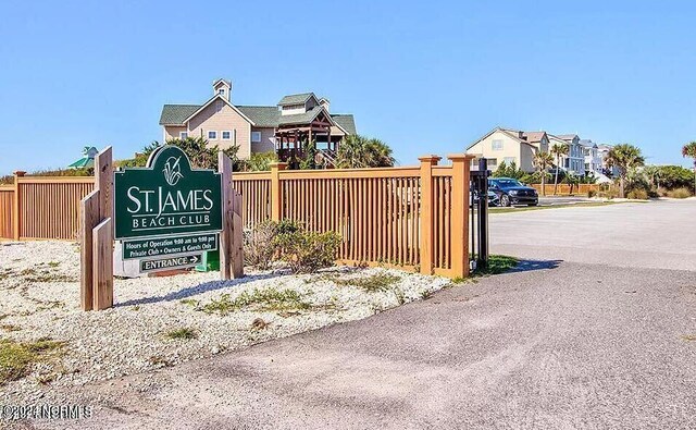 2537 St James Dr SE Unit 303, Southport, NC 28461 - community sign with a residential view