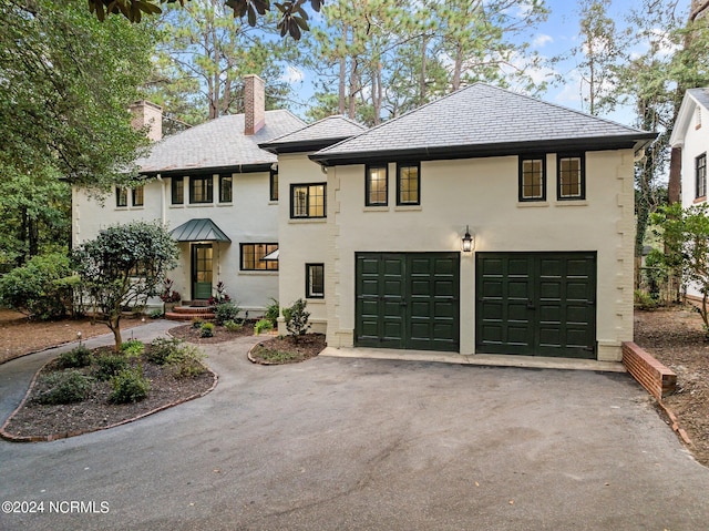 view of front of home with a garage