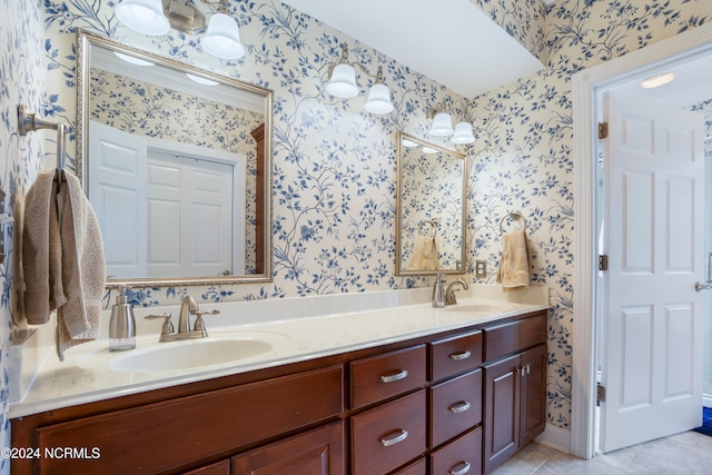 bathroom with tile patterned flooring and vanity