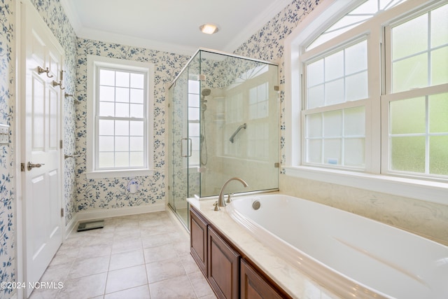 bathroom with crown molding, tile patterned floors, and separate shower and tub