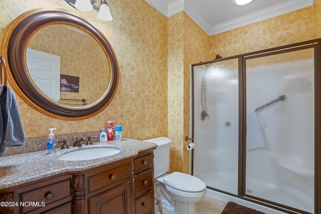 bathroom with walk in shower, crown molding, vanity, and toilet