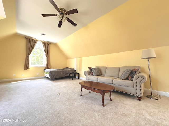 bedroom with light carpet, vaulted ceiling, and ceiling fan