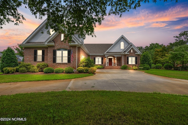 craftsman-style house with a lawn