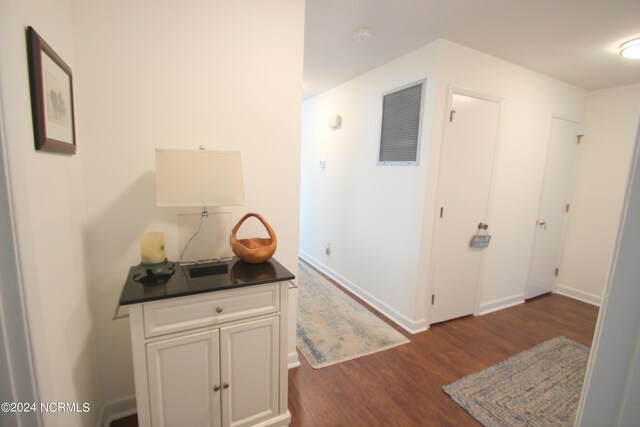 hall featuring dark hardwood / wood-style flooring