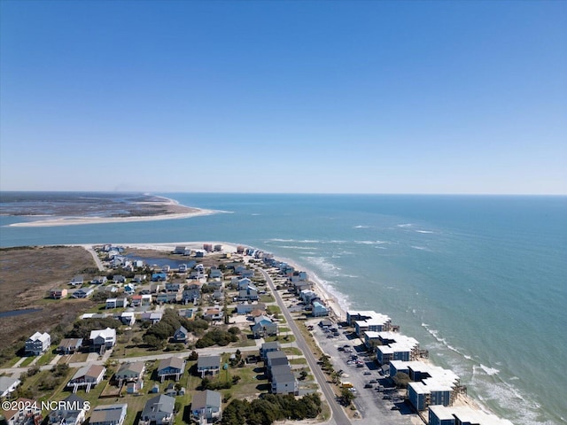 aerial view featuring a water view and a view of the beach