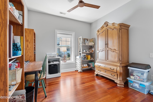 office space with ceiling fan and hardwood / wood-style floors