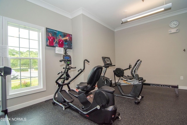 workout area with crown molding