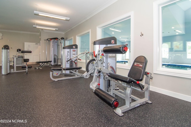 workout area with ornamental molding