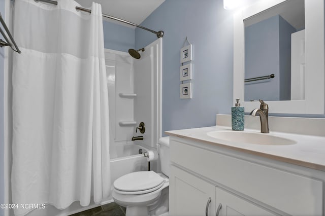 full bathroom featuring shower / bath combination with curtain, vanity, tile patterned flooring, and toilet