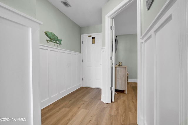 hallway featuring light hardwood / wood-style flooring