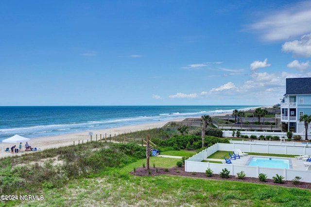 view of water feature with a beach view