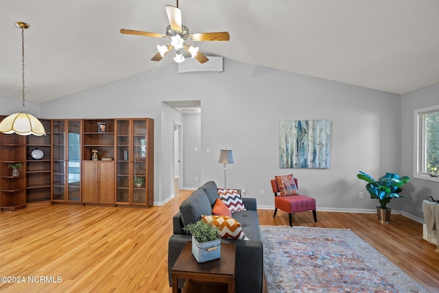 living room with an AC wall unit, ceiling fan, and wood-type flooring