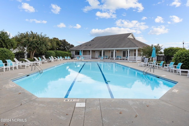 view of pool featuring a patio