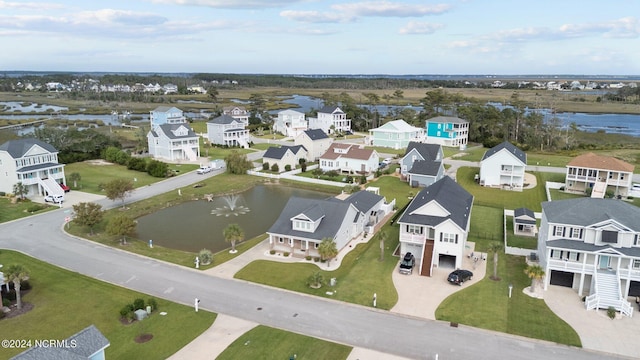 drone / aerial view featuring a water view