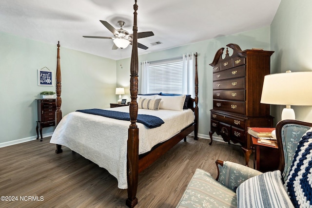 bedroom with wood-type flooring and ceiling fan