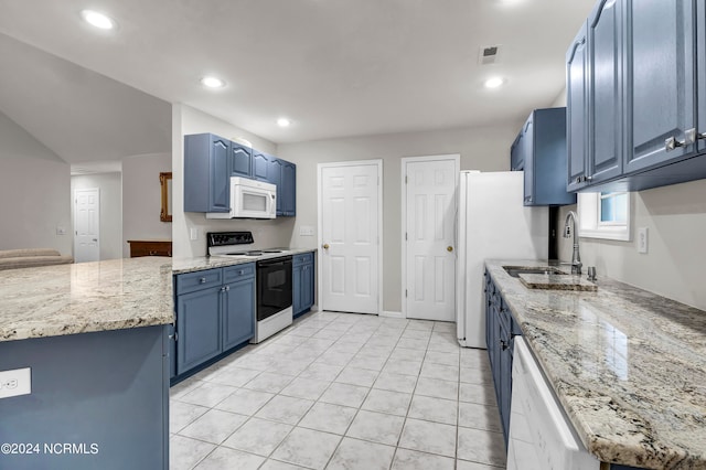 kitchen featuring white appliances, blue cabinetry, and sink