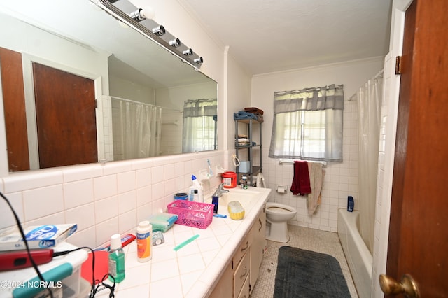 full bathroom featuring vanity, shower / bath combo, tile patterned floors, tile walls, and toilet