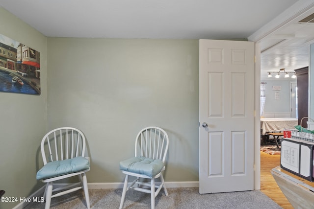 living area with wood-type flooring