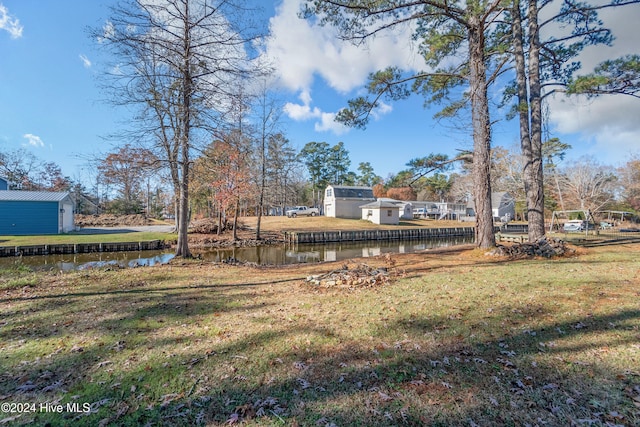 view of yard with a water view