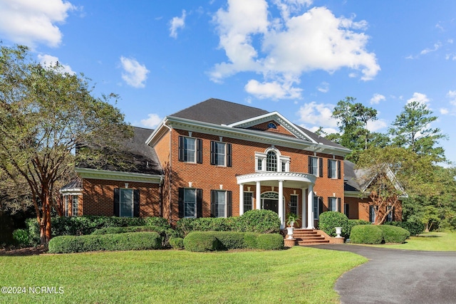 colonial house with a front yard