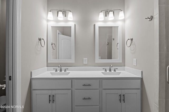 bathroom featuring vanity and walk in shower