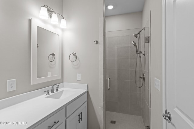 bathroom with vanity and walk in shower