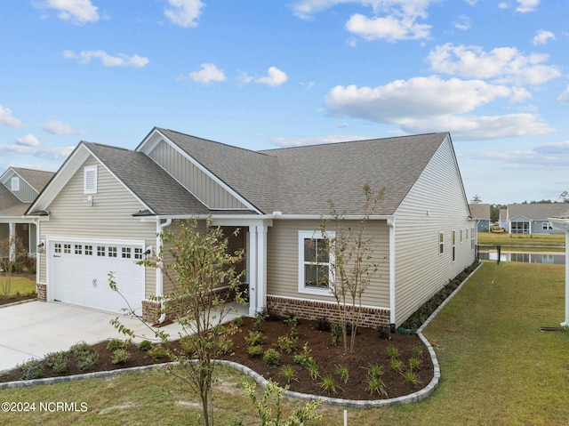 view of front facade featuring a garage and a front lawn