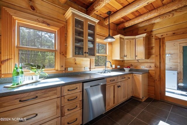 bedroom with beam ceiling, connected bathroom, light hardwood / wood-style flooring, and multiple windows