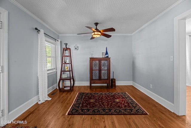 unfurnished room with crown molding, ceiling fan, and hardwood / wood-style flooring