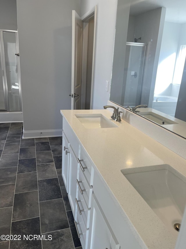 bathroom featuring vanity and walk in shower