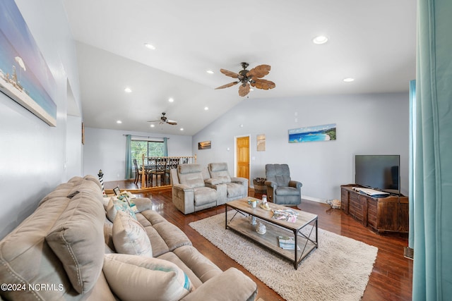 living room featuring ceiling fan, vaulted ceiling, and dark hardwood / wood-style flooring