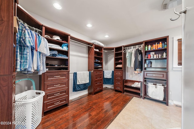 walk in closet featuring wood-type flooring