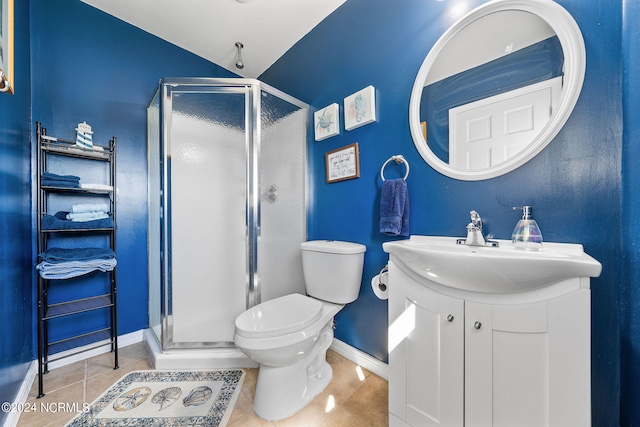 bathroom featuring tile patterned flooring, toilet, an enclosed shower, vaulted ceiling, and vanity