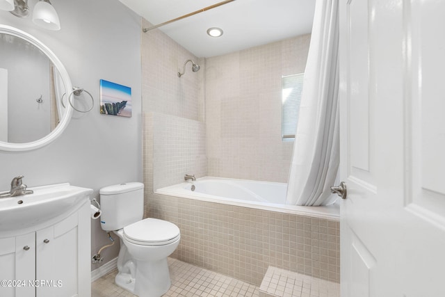 full bathroom featuring vanity, shower / tub combo, toilet, and tile patterned floors