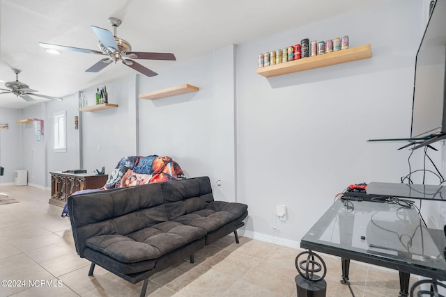 tiled living room with ceiling fan