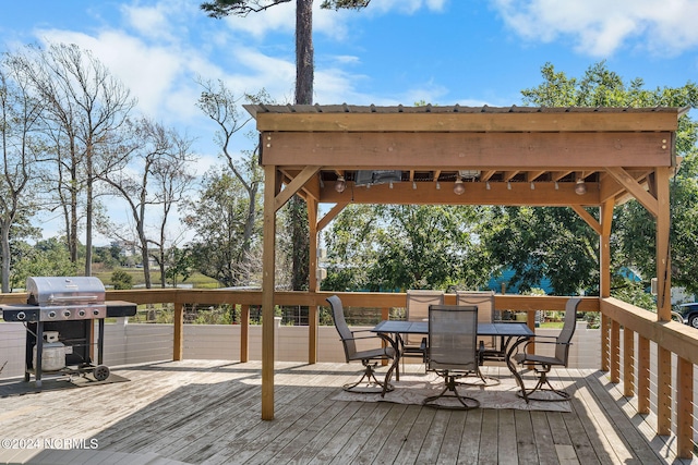 wooden deck with area for grilling