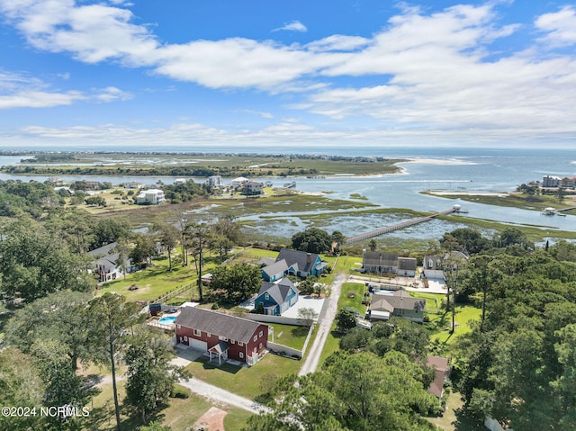 drone / aerial view with a water view