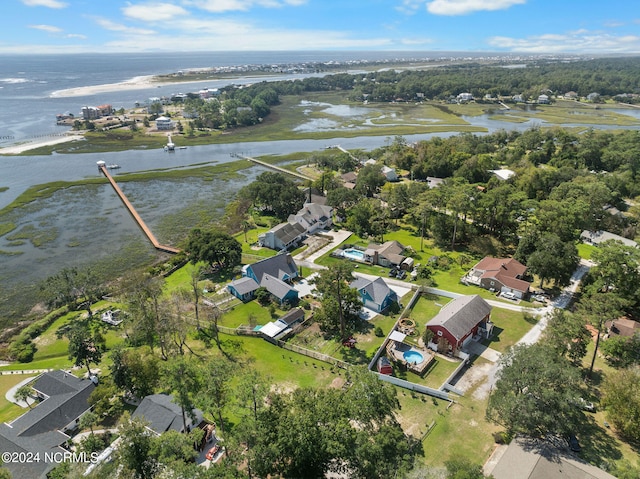 bird's eye view with a water view