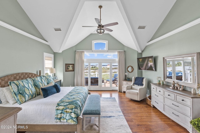 bedroom featuring wood-type flooring, multiple windows, access to outside, and ceiling fan