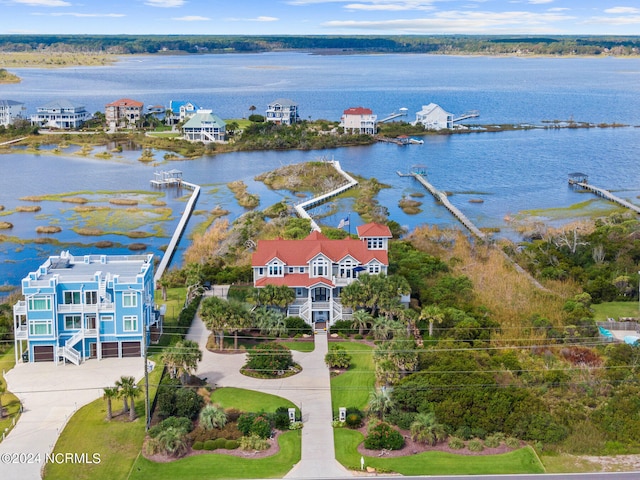 birds eye view of property featuring a water view