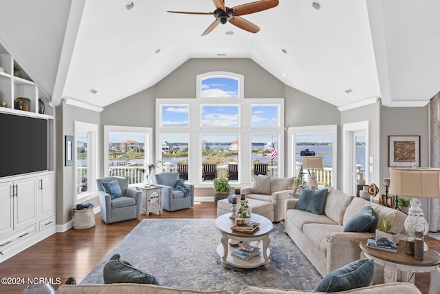 living room featuring a water view, dark hardwood / wood-style floors, ceiling fan, and high vaulted ceiling