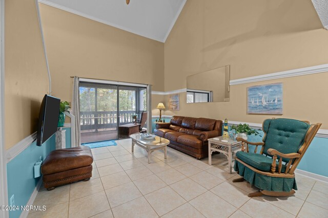 tiled living room with high vaulted ceiling